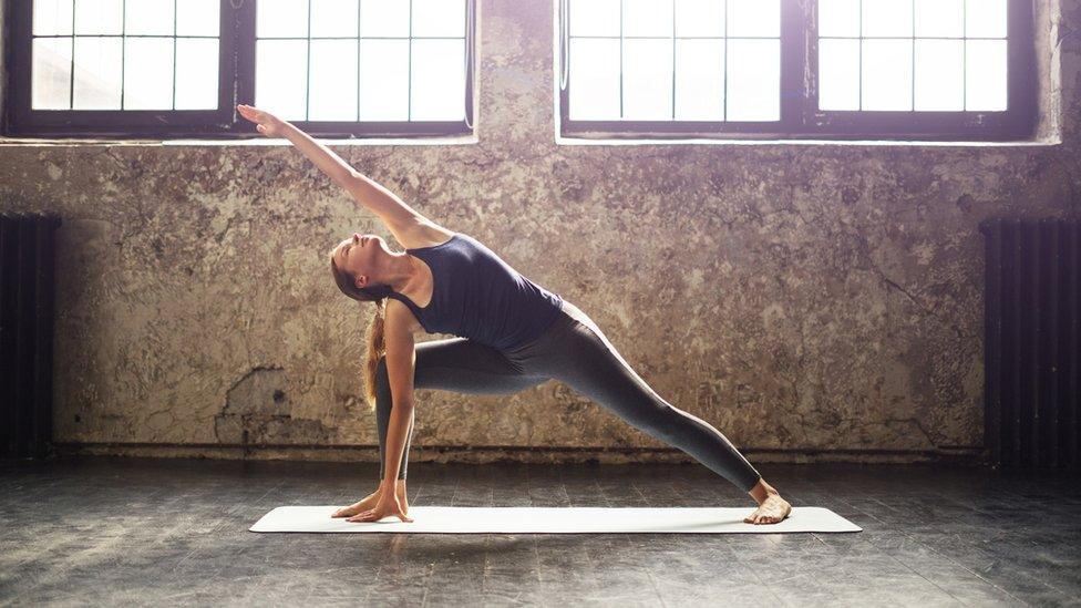 Woman practising yoga