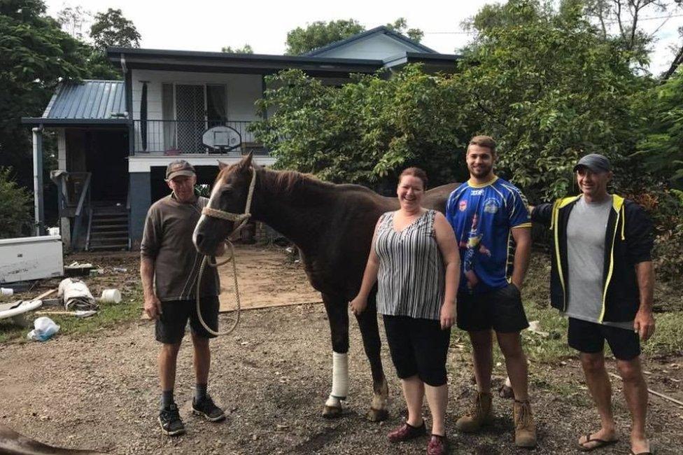 Rob (third from left) and Leigh Shepherd (far right) with the horse and its owners