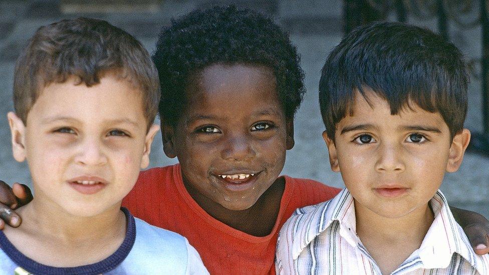 Three children in Akko