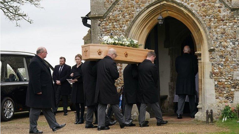 Betty Boothroyd's coffin being carried