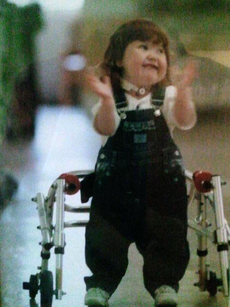 Shauna as a toddler, clapping