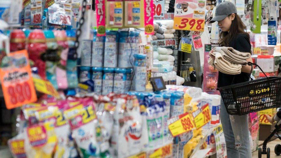 A woman shops in Japan