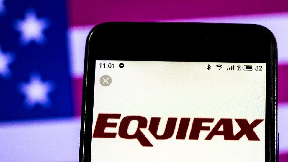 Equifax logo on mobile phone