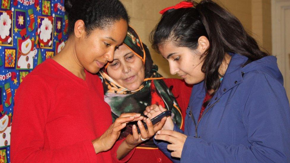 Jaya James (left) with Gaziye Fettah and Rojin Haci, who were sponsored by Jim Estill and the Muslim Society of Guelph