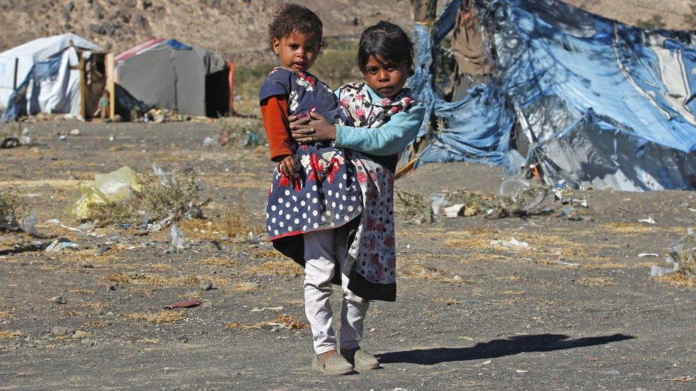 Refugee-and-her-sister.