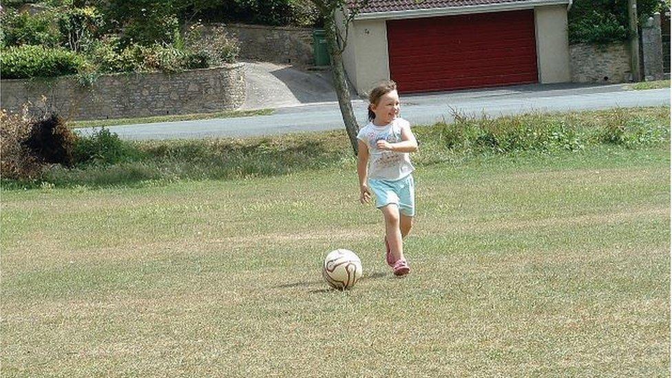 Rachel playing football