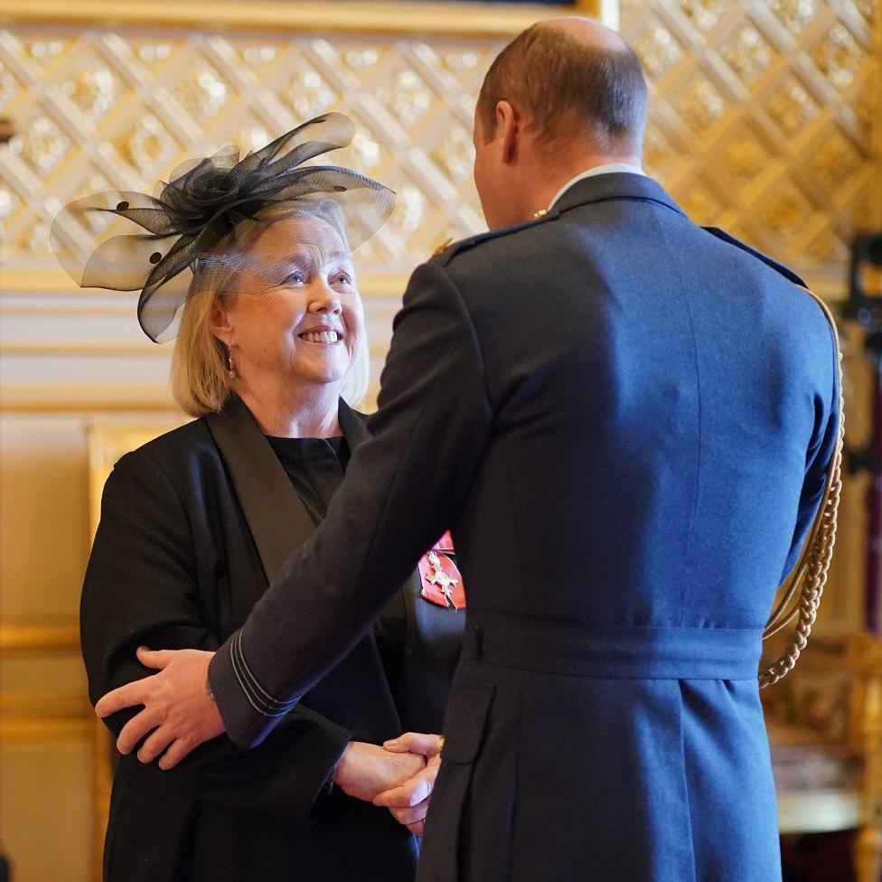 Quirke receiving her MBE from the Prince of Wales at Windsor Castle in 2023