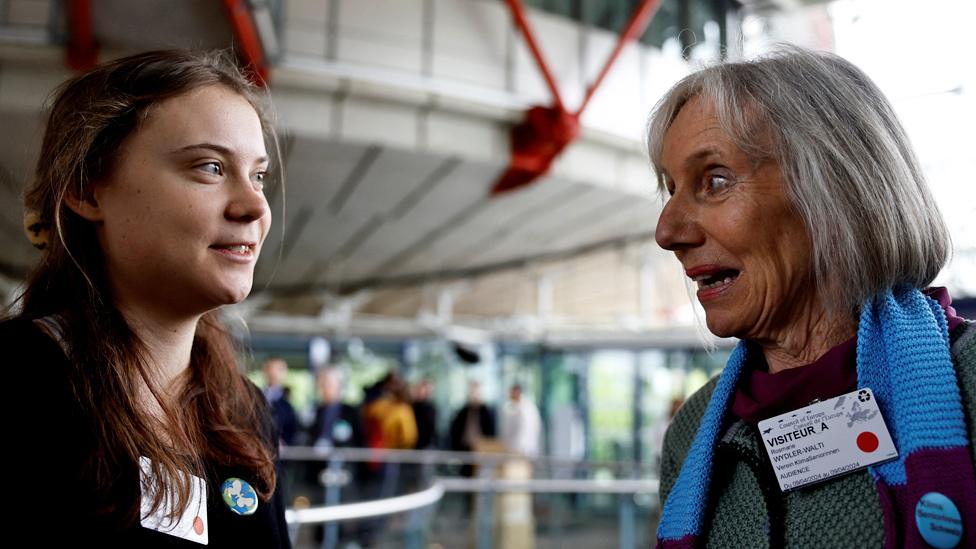 Greta Thunberg with court case winner