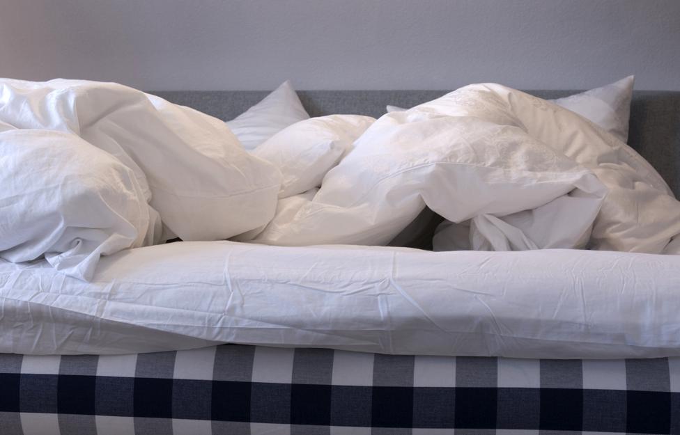Duvet, unmade bed