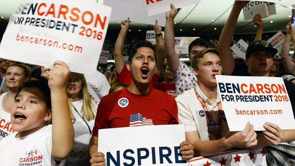 Ben Carson supporters cheer at a rally in California