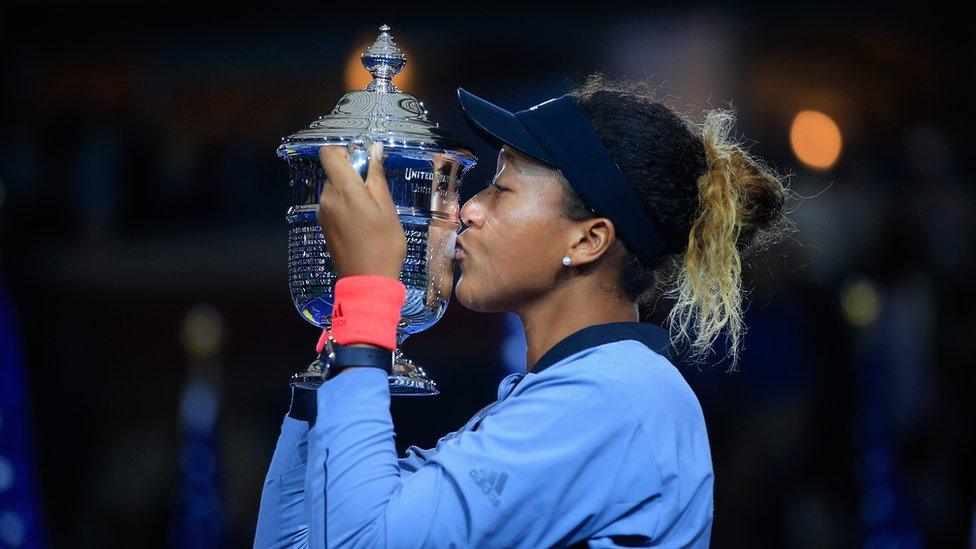 Ms Osaka with the trophy