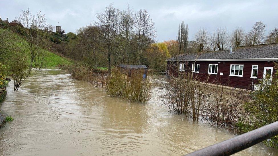 Flood waters around a building in 2023