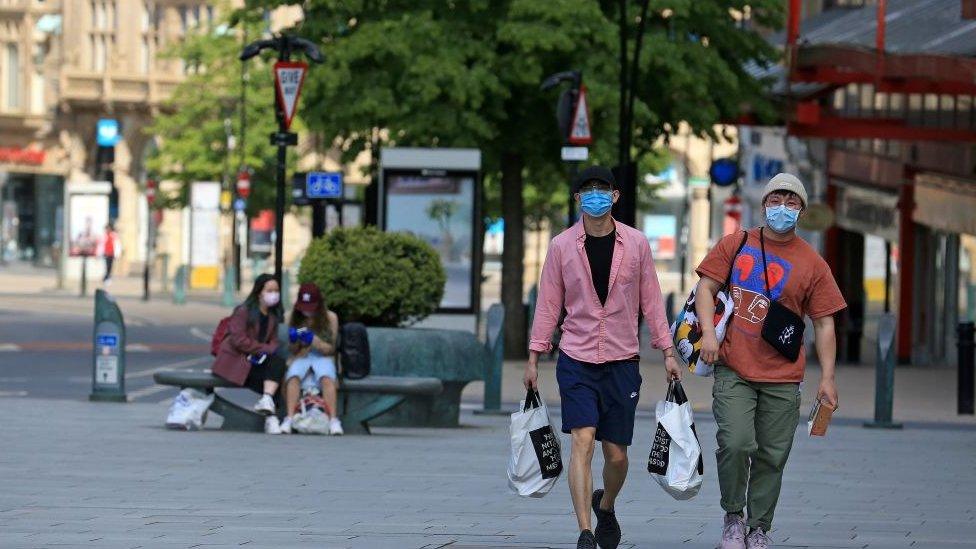 People wearing masks in Sheffield