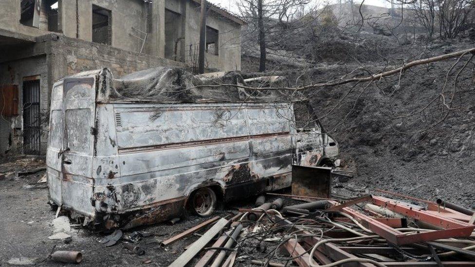 A burnt out house and a destroyed car in the Larnaca region, Cyprus. Photo: 4 July 2021