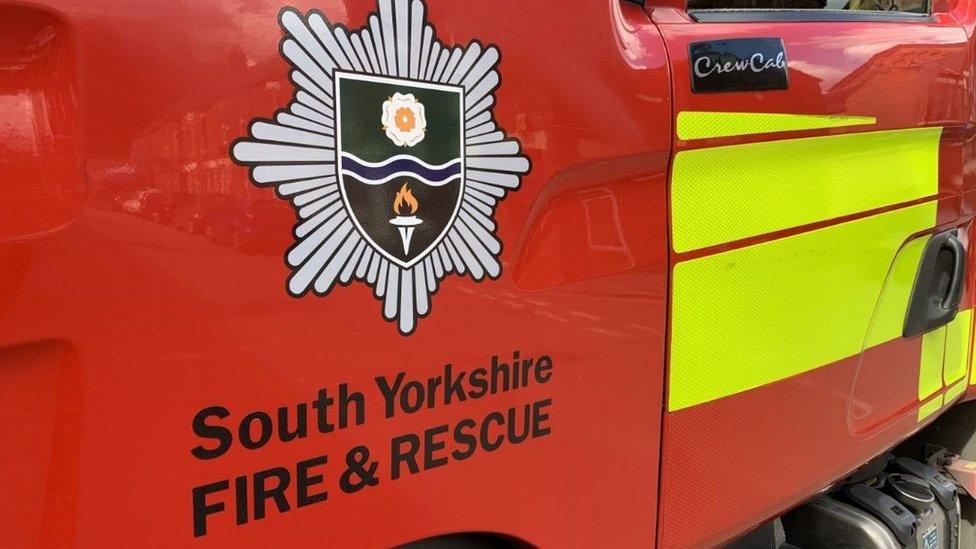 South Yorkshire Fire & Rescue Service logo on fire engine