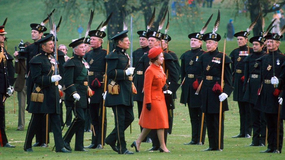 The Queen inspects a guard of honour during her Silver Jubilee visit to Scotland in May 1977