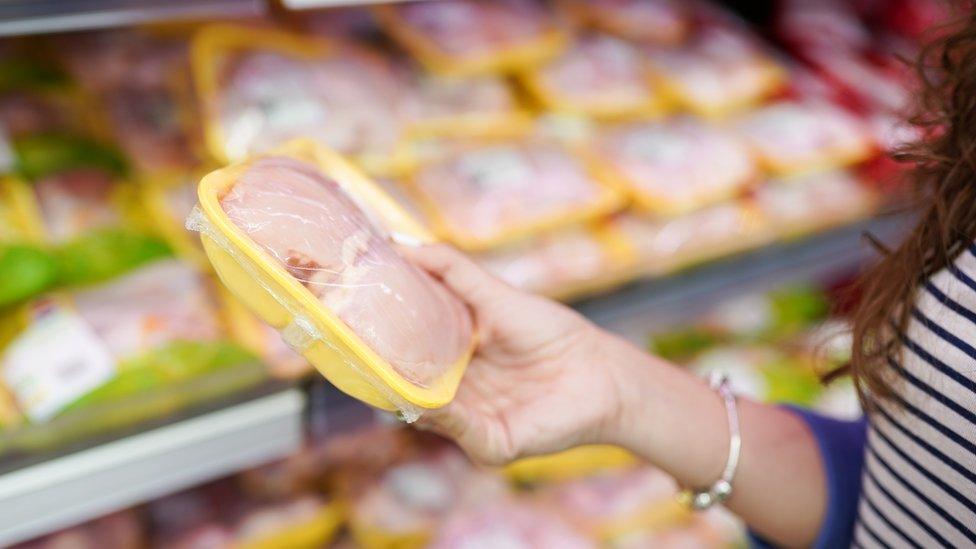 Buying chicken in a supermarket