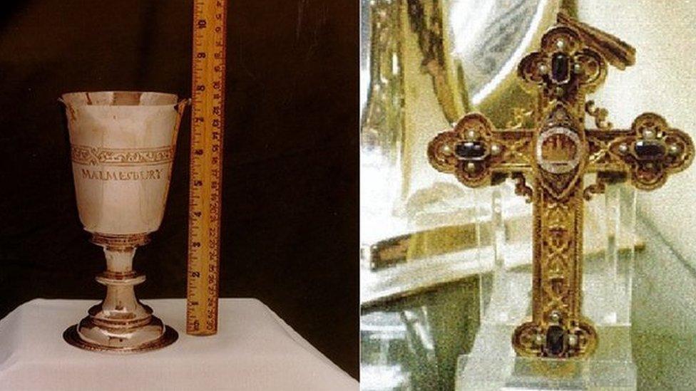 Two silver chalice cups and a gold cross