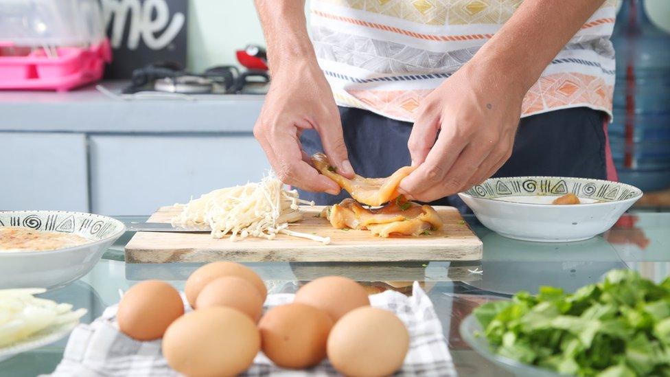 man cooking