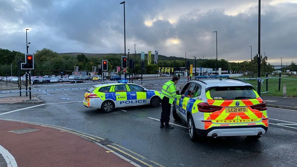 Police cars at scene