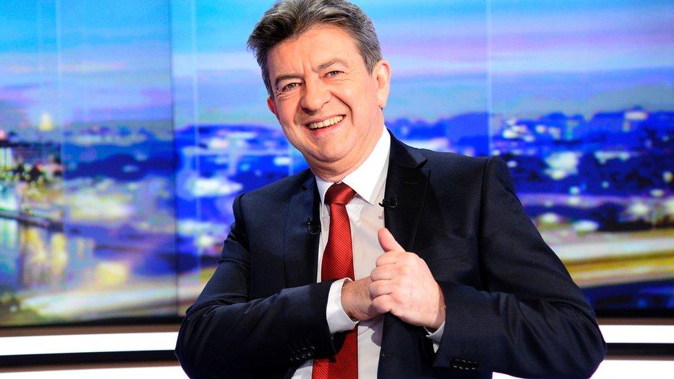 Mr Melenchon on the TV set, dressed smartly