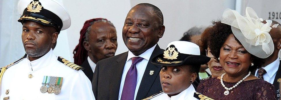 South Africa's new President Cyril Ramaphosa (centre) arrives to deliver his state of the nation address at the parliament in Cape Town on 16 February 2018