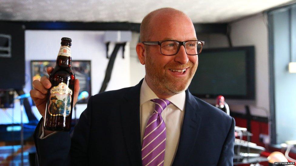 Paul Nuttall with a bottle of beer