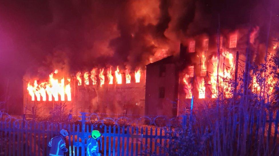 Firefighters outside the building