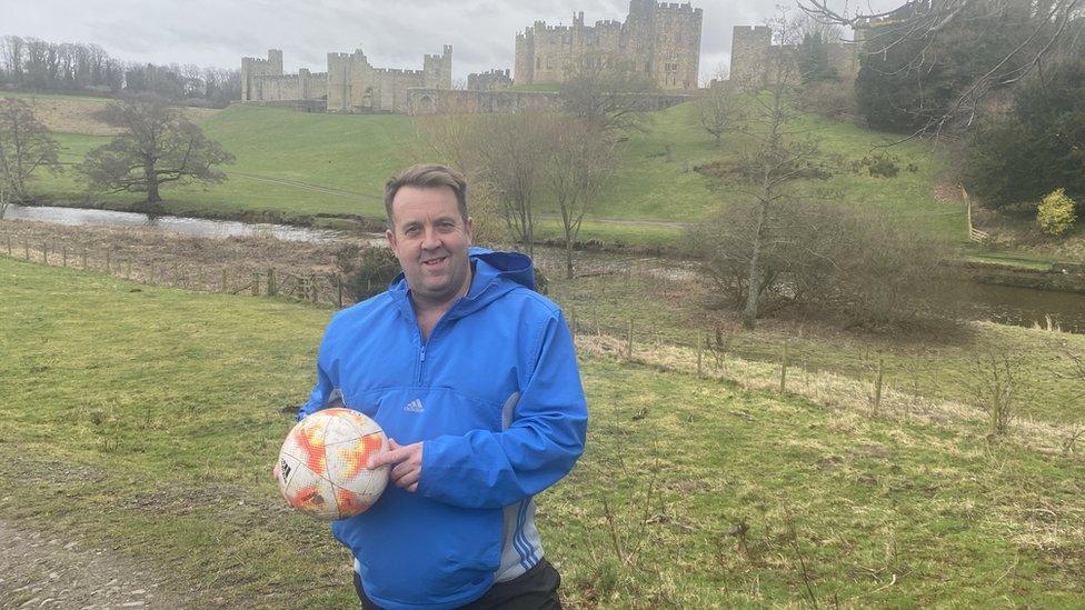 Stephen Temple standing on the edge of the Pastures where the game is played