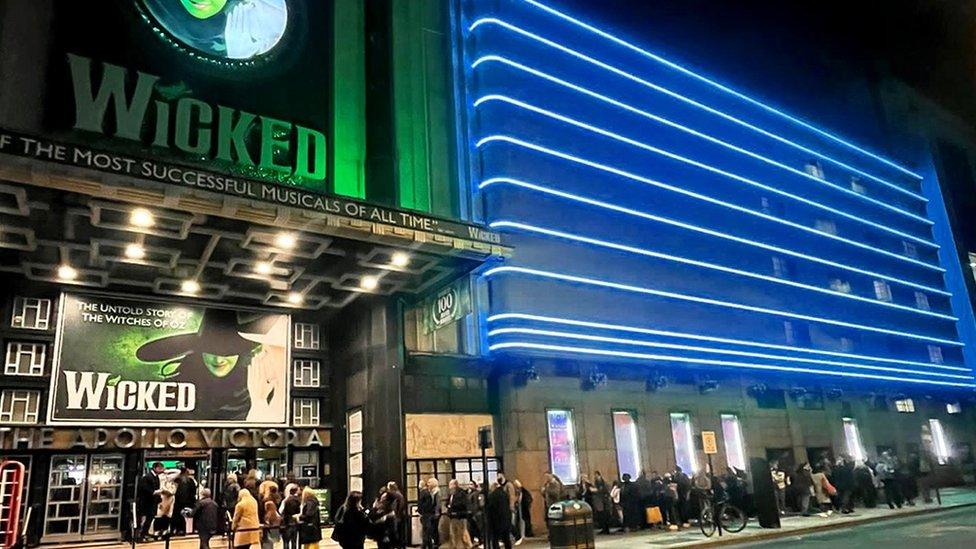 Apollo Victoria Theatre with blue lights