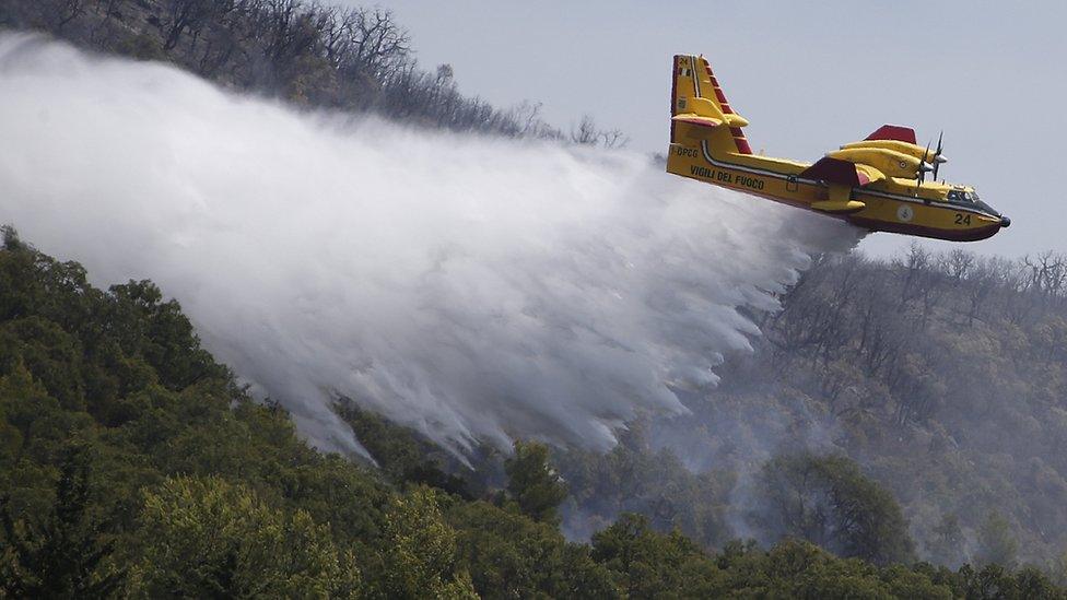 Canadair plane dropping water on blaze near Bormes-les-Mimosas, 27 Jul 17