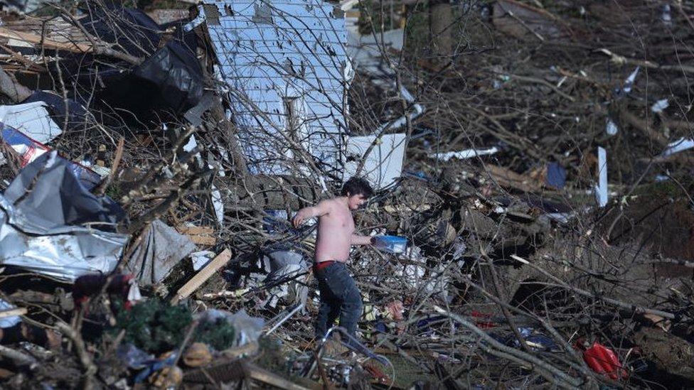 Residents continue to salvage belongings from destroyed homes in Mayfield