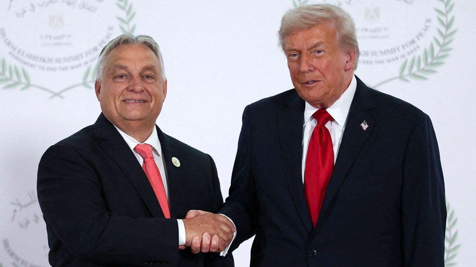 Hungarian Prime Minister Viktor Orban shakes hands with US President Donald Trump during the Sharm El Sheikh Peace Summit in Egypt on Monday 13 October 2025.