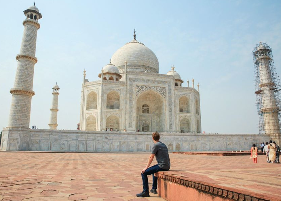 Facebook CEO Mark Zuckerberg sits facing the Taj Mahal during his visit to India in October 2015