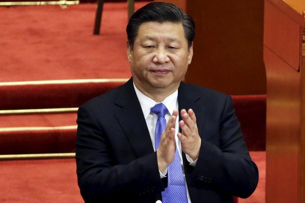 China's President Xi Jinping claps during the closing ceremony of the Chinese People"s Political Consultative Conference (CPPCC) at the Great Hall of the People, in Beijing, China, 14 March 2016