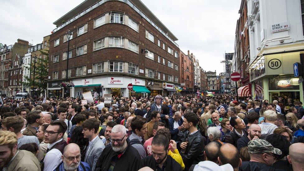 Vigil for victims of Orlando nightclub shooting outside Admiral Duncan pub on Old Compton Street, Soho, London. 13 June 2016