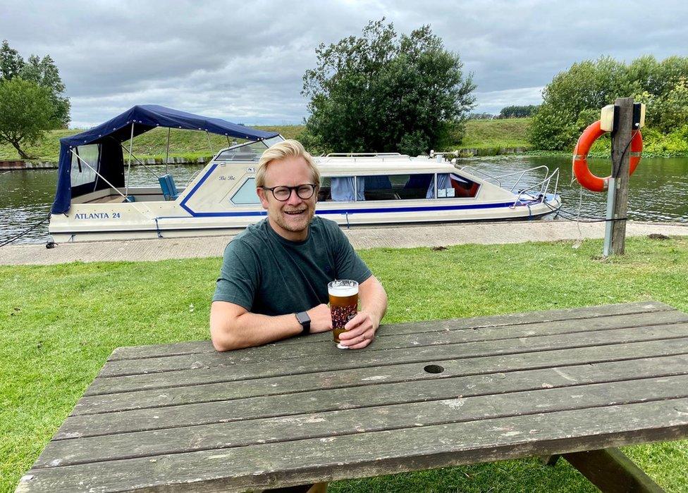 Tom Jones enjoying a pint