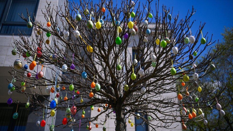 Painted Easter eggs decorate a tree in the Easter Park of Hajduszoboszlo, Hungary, 12 April 2022. The park was decorated by artists, art school teachers and students for the upcoming holiday.