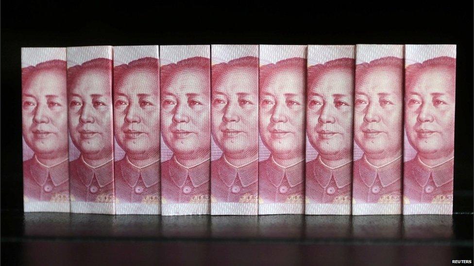 Chinese 100 Yuan banknotes are seen in this picture illustration taken in Beijing 11 July 2013