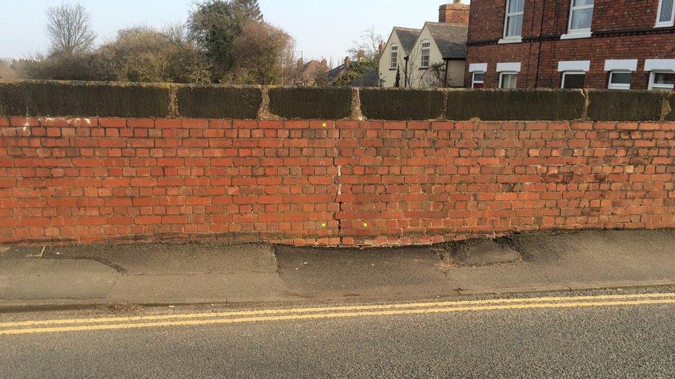 Cracks in the bridge wall, before the collapse took place