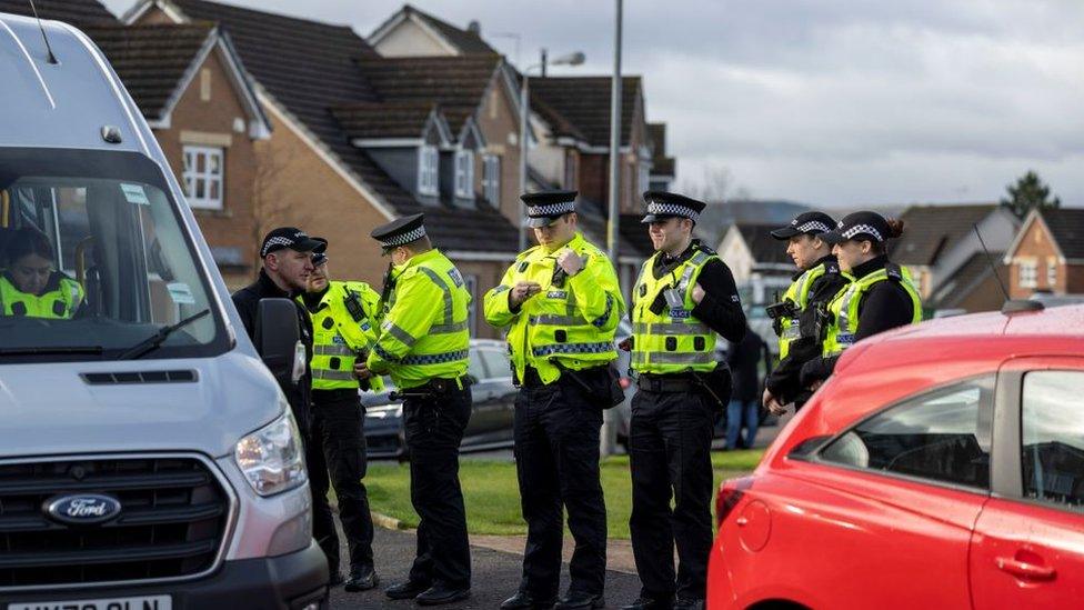 A significant police presence remained at the house on Thursday