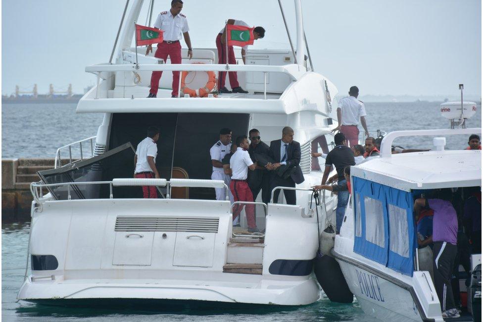 Unidentified injured people are evacuated after a blast on the Maldives President Yameen Abdul Gayoom speedboat in Male, Maldives Monday, 28 Sept 2015