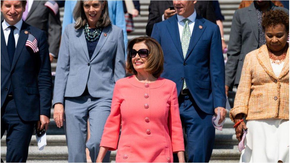 Speaker of the House Nancy Pelosi with fellow House Democrats