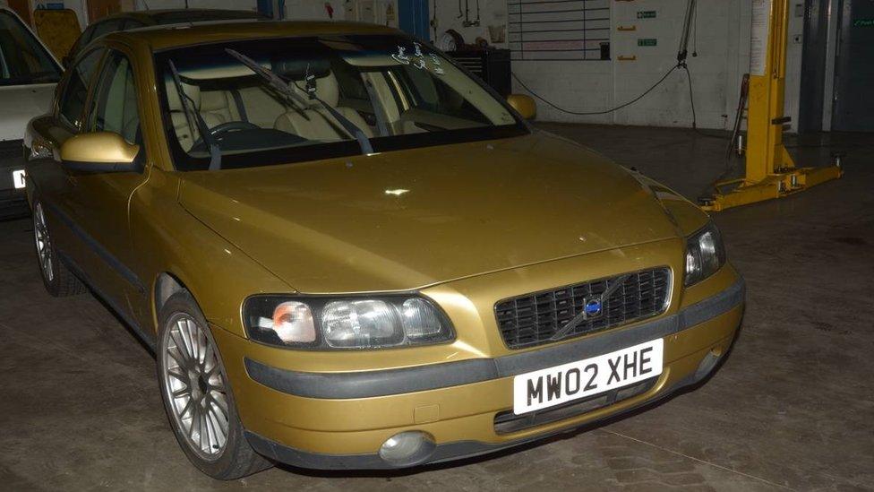 Gold-coloured Volvo