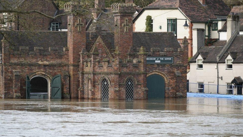 Museum of The Gorge is seen as temporary flood barriers are overwhelmed by flood water