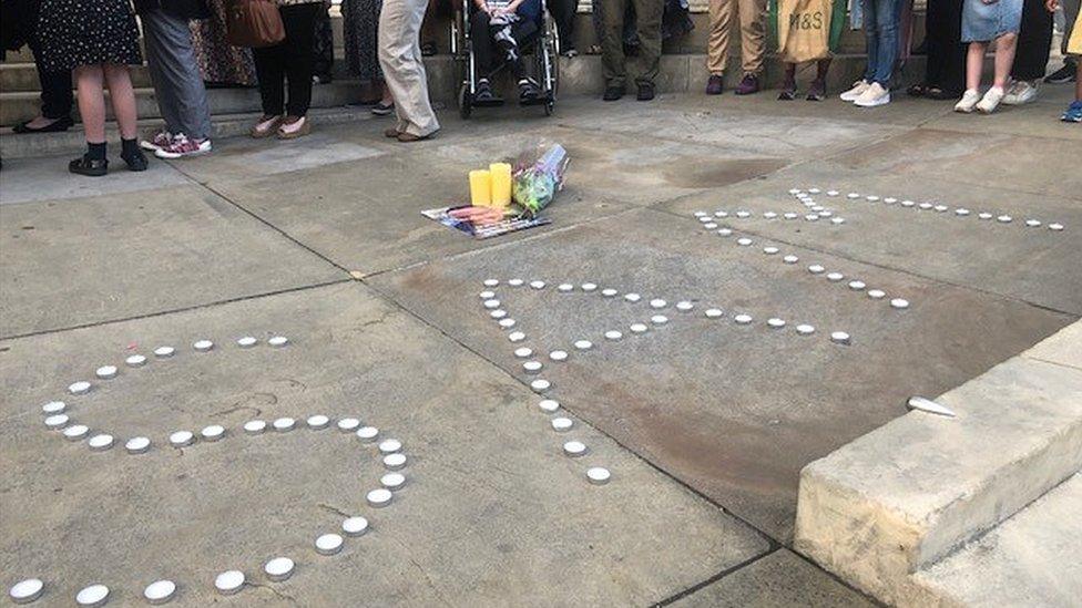 Mr Diatta's name spelled out with candles