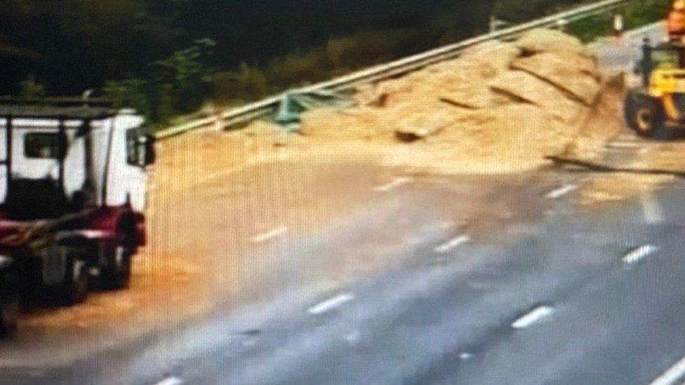 Debris is strewn across the M6