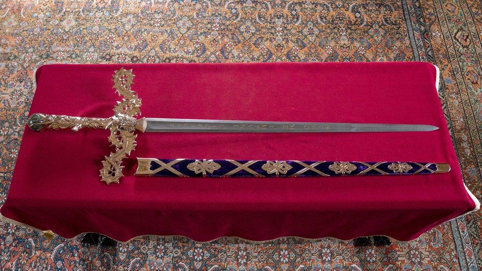 The Elizabeth sword on a red velvet coloured table