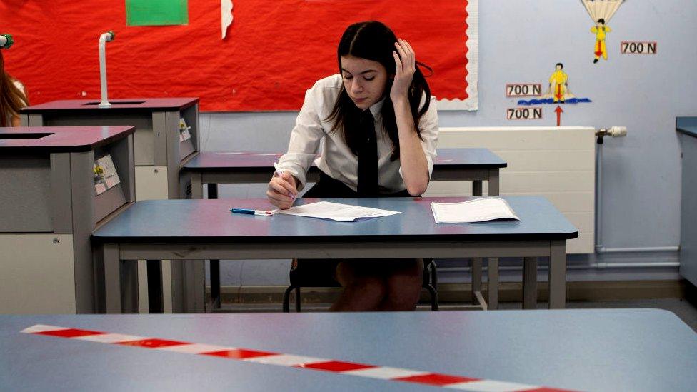 school pupil in socially distanced classroom