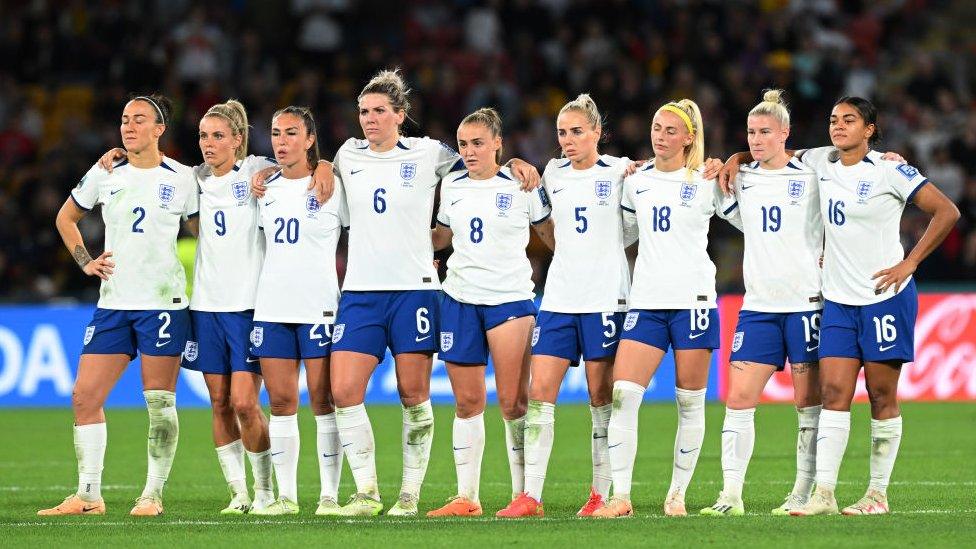 England players line up during the penalty shoot out in the FIFA Women's World Cup